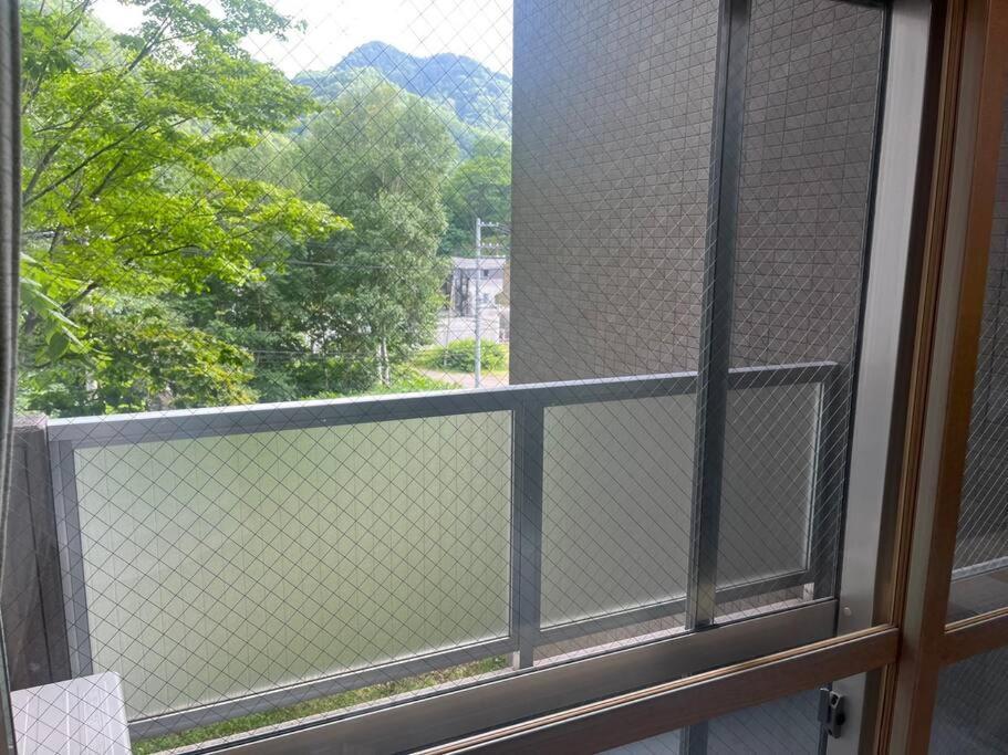 札幌市フューデイズコンドミニアム定山渓201号室アパートメント エクステリア 写真
