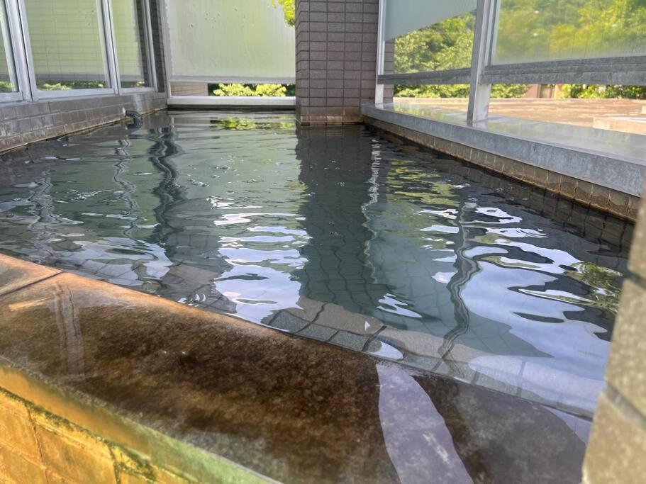 札幌市フューデイズコンドミニアム定山渓201号室アパートメント エクステリア 写真